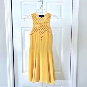 Pastel yellow above-the-knee dress. Size small, worn once, great condition!